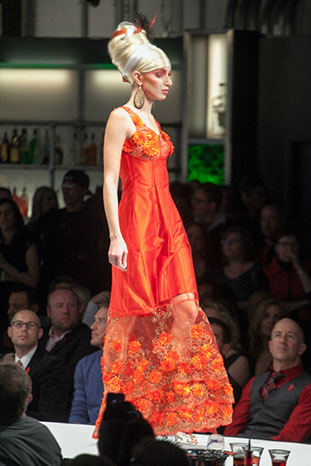 D'Lola Couture transparent lace sheath gown at Red Ball 2012 Fashion Show.
