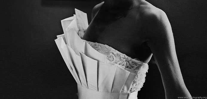 This wedding gown is a two piece in which the train and bodice piece come off... 