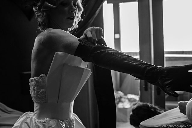 This wedding gown is a two piece in which the train and bodice piece come off... 