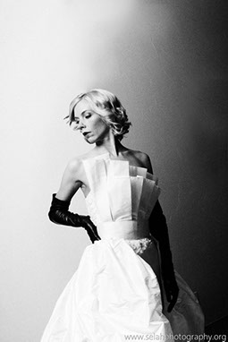 This wedding gown is a two piece in which the train and bodice piece come off... 